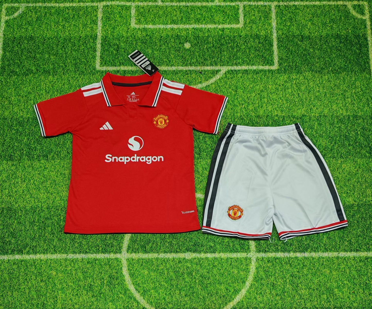 Manchester United 26/27 home kids jersey